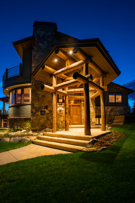 intricate log work entry into Crested Butte home